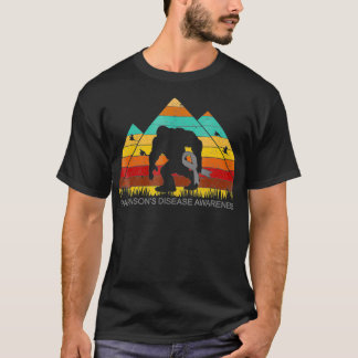 Camiseta Pé-Grande Traz a fita da DOENÇA DE PARKINSONS engr