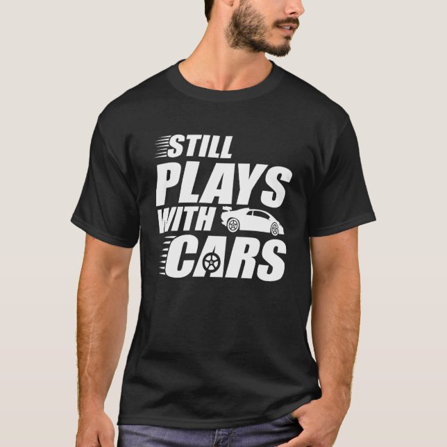 Camiseta Peças Com Carros Ainda Jogam Com Carros (Frente)