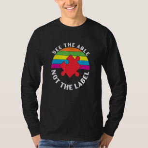 Camiseta peças quebra-cabeça coloridas Autismo Consciência