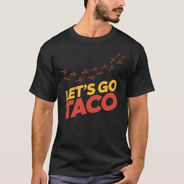 Camiseta Pegadas de frango do vamos Go Taco (Frente)