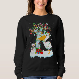Camiseta Pelican Bird Xmas Tree Lighting Santa Hat Pelican