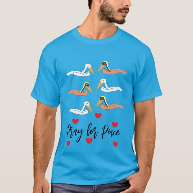Camiseta Pelicanos Rezando pela Paz:  (Frente)