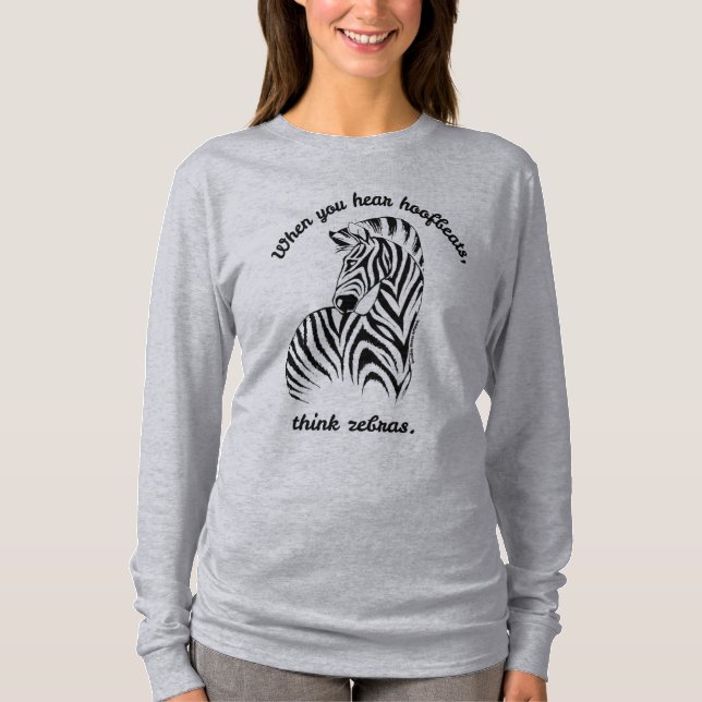 Camiseta Pense a doença rara das zebras… (Frente)