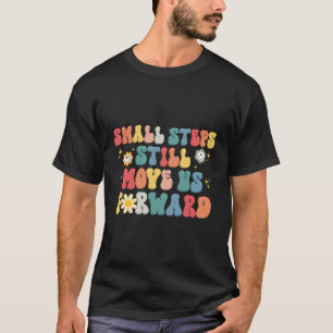Camiseta Pequeno Passo Ainda Nos Move Para Frente Terapias