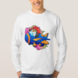 Camiseta Pinguim como piloto com avião