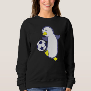 Camiseta Pinguim jogando futebol