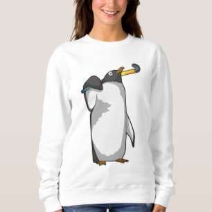Camiseta Pinguim no Hockey com palito de hóquei
