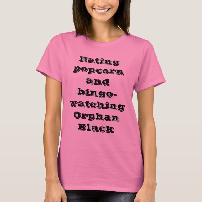 Camiseta pipoca e bibge do eatng que olham o preto órfão (Frente)