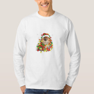 Camiseta Pomerânia molhada em luzes de Natal