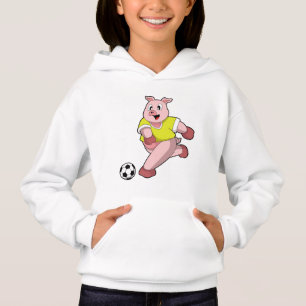 Camiseta Porco como jogador de futebol com bola de futebol