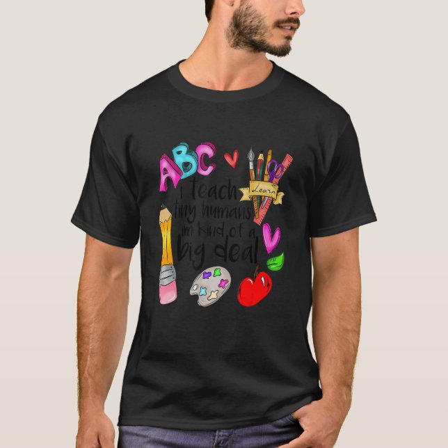 Camiseta Professora de creche Ensino Humanos Pequenos Eu so (Frente)