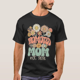 Camiseta Promovida a Mãe 2026 Flor Silvestre Gravidez Esper