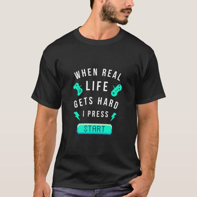 Camiseta Quando a Vida Real Fica Difícil Eu Pressiono Inici (Frente)