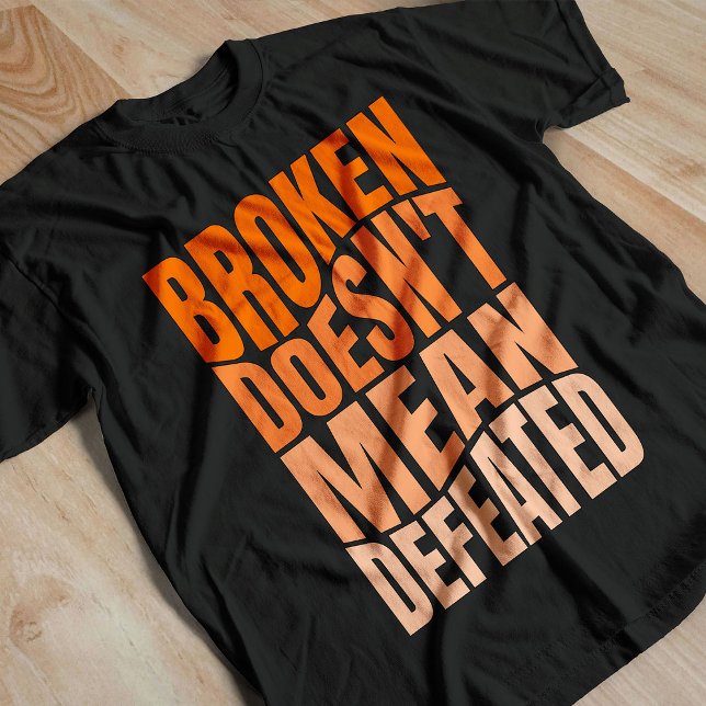 Camiseta Quebrado não significa derrotado (Criador carregado)