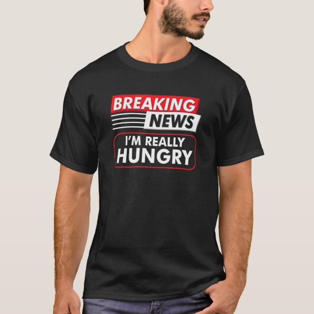 Camiseta Quebrando notícias Eu estou com muita fome de Comi (Frente)