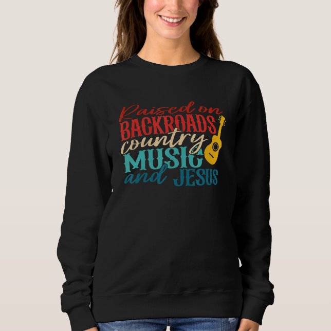 Camiseta Raised On Backroadst Country Music And Jesus Retro (Frente)