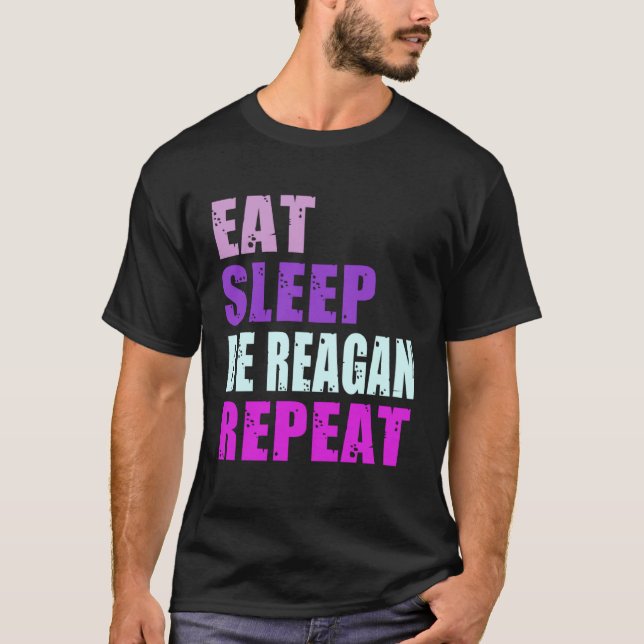 Camiseta Reagan Come Sleep Be Repetir Reagan (Frente)