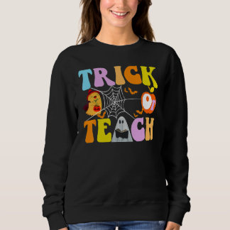 Camiseta Retro Vintage Groovy Trick Or Teach Halloween Cost