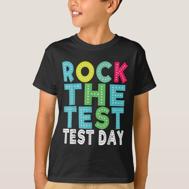 Camiseta Rock The Test Testing Day Staar Motivational Teach (Frente)