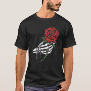 Camiseta Rosa vermelha de retenção da mão do esqueleto