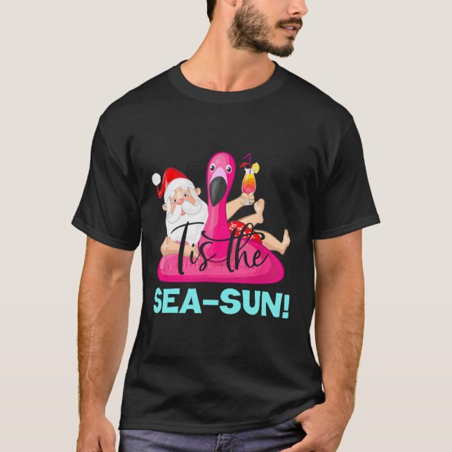 Camiseta Santa Claus Flamingo Float Tis The Sea-sun Christm (Frente)