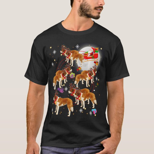 Camiseta Santa Claus Riding Santo Bernard Natal Pajamas (Frente)