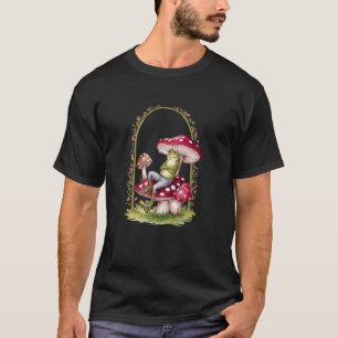 Camiseta Sapo cottagecore em cogumelos relaxando com carinh