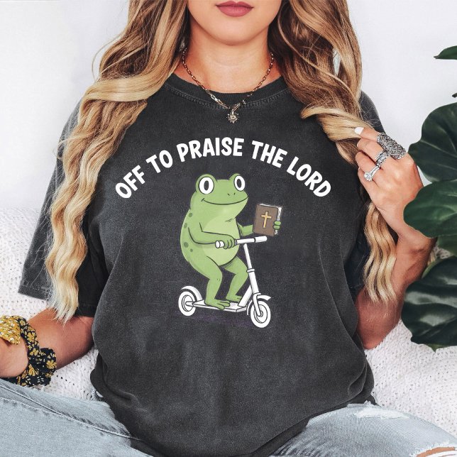 Camiseta Sapo Engraçado Andando de Scooter com Bíblia (Criador carregado)