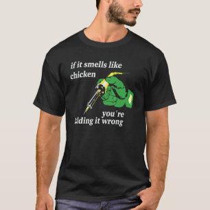 Camiseta Se cheira como frango, você está segurando errado