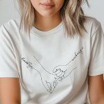 Camiseta Segurando Mãos Besties Nome Personalizado Amizade<br><div class="desc">Esta ilustração de arte lindamente minimalista de duas mãos se segurando faz um presente perfeito para os melhores amigos que querem mostrar seu vínculo inviolável. Adicione seus nomes e crie uma peça verdadeiramente personalizada que você vai apreciar para sempre.</div>