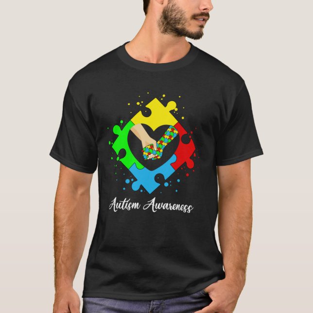 Camiseta Segurando Mãos no Quebra-Cabeça do Coração Conscie (Frente)