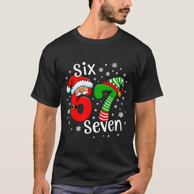 Camiseta Seis Sete 67 Meme 6 7 Elfo Papai Noel Natal  (Frente)