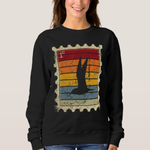 Camiseta Selo Postal Com Um Pássaro Voador Ao Pôr do Sol