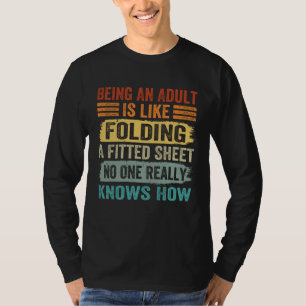 Camiseta Ser Adulto é Como Dobrar Uma Folha Ajustável 2