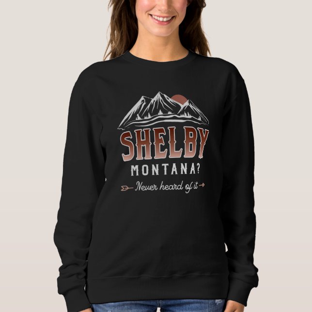 Camiseta Shelby Montana Never Heard of it - MT Conspiracy T (Frente)