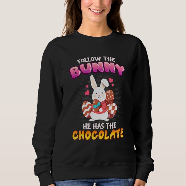 Camiseta Siga O Coelhinho Que Ele Tem Felz pascoa De Chocol (Frente)