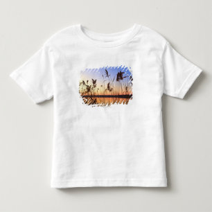 Camiseta Silhueta da planta pelo por do sol da beira do