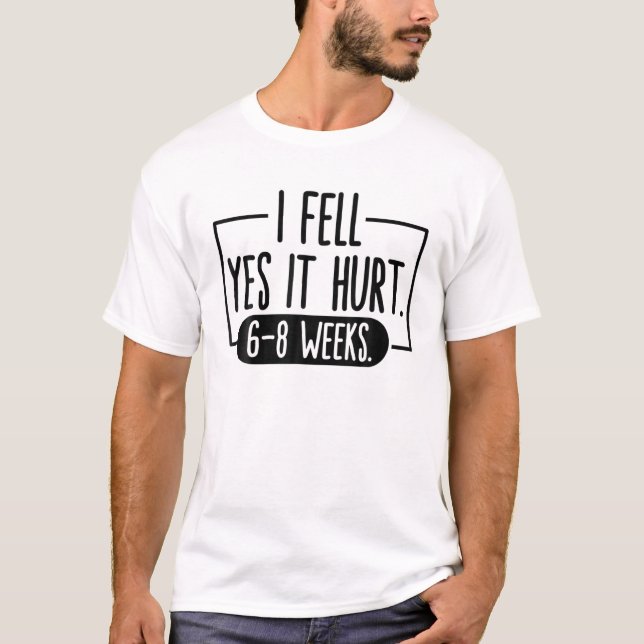 Camiseta SINTO QUE MACHUCOU 6 A 8 SEMANAS, FELIZMENTE, Braç (Frente)