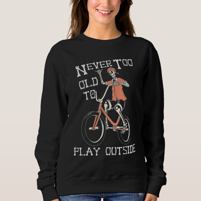 Camiseta Skeleton Riding Bicycle Never Too Old to Play Outs (Frente)