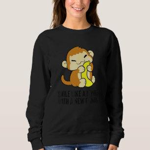 Camiseta Sorria Como Um Macaco Com Uma Banana Nova