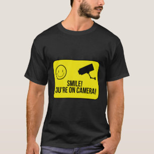 Camiseta Sorria Que Está No Tema De Vigilância Da Câmera