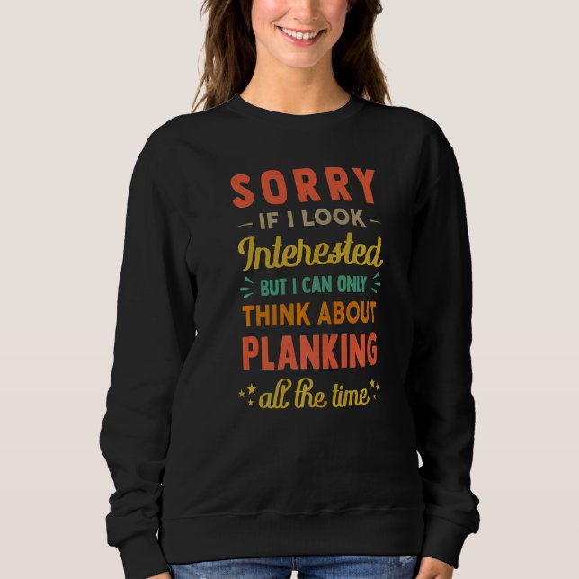 Camiseta Sorry If I Look Interested  Think About Planking   (Frente)
