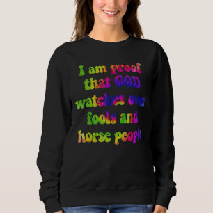 Camiseta Sou a prova de que Deus cuida de tolos e cavalos p