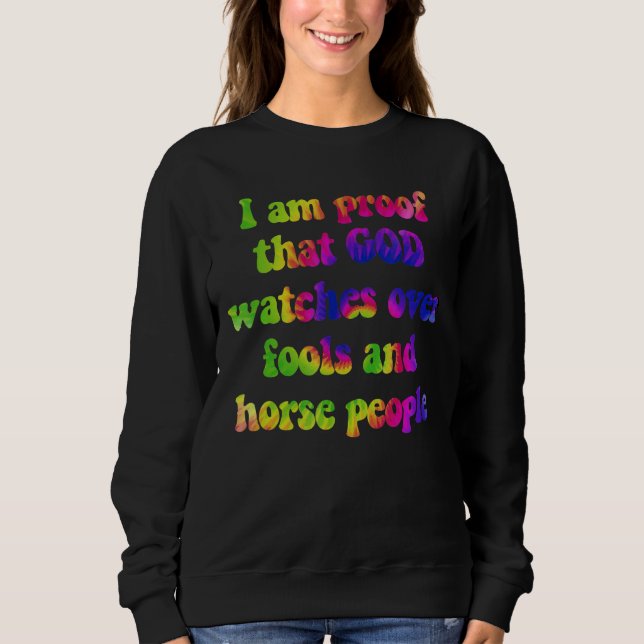 Camiseta Sou a prova de que Deus cuida de tolos e cavalos p (Frente)