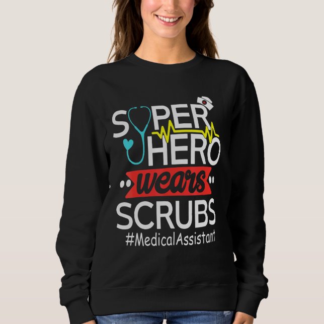 Camiseta Super Heróis do Assistente Médico Vestem Enfermage (Frente)