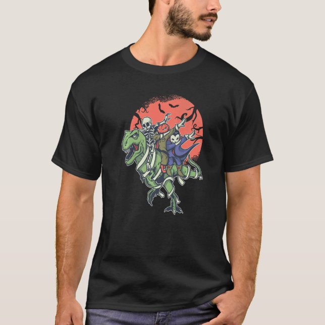 CAMISETA T REX HALLOWEEN SKELETON RIDANDO MUMMY DINOSAUR RE (Frente)