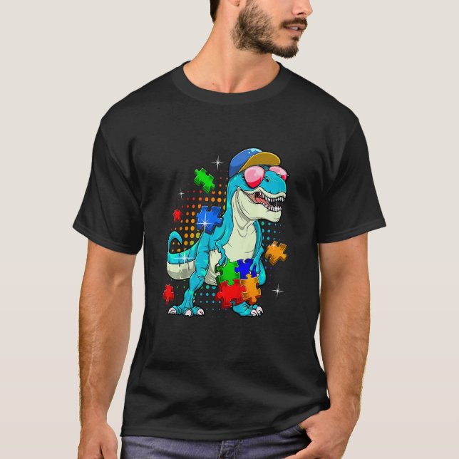 Camiseta T Rex Segurando Puzzle Roupa Divertida Conscientiz (Frente)