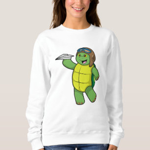 Camiseta Tartaruga como piloto com avião em papel