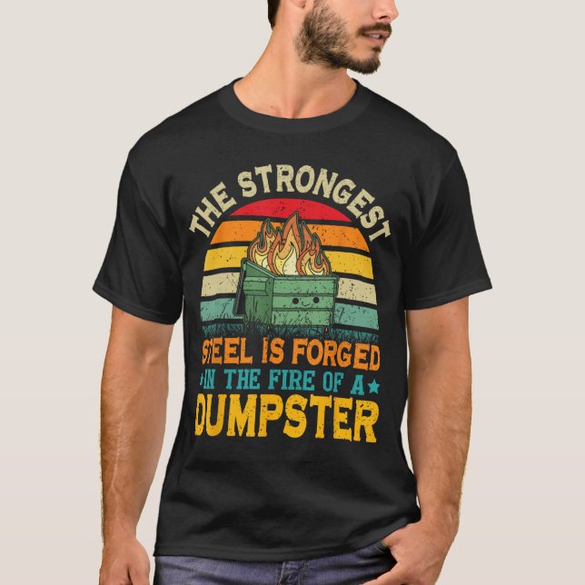 Camiseta The Strongest Steel is Forged inhe Fire of a Dumps (Frente)