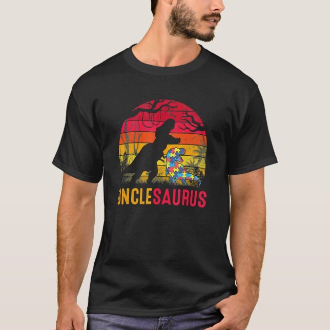 Camiseta Tio Saurus Rex Consciência do Autismo Dinossauro E (Frente)